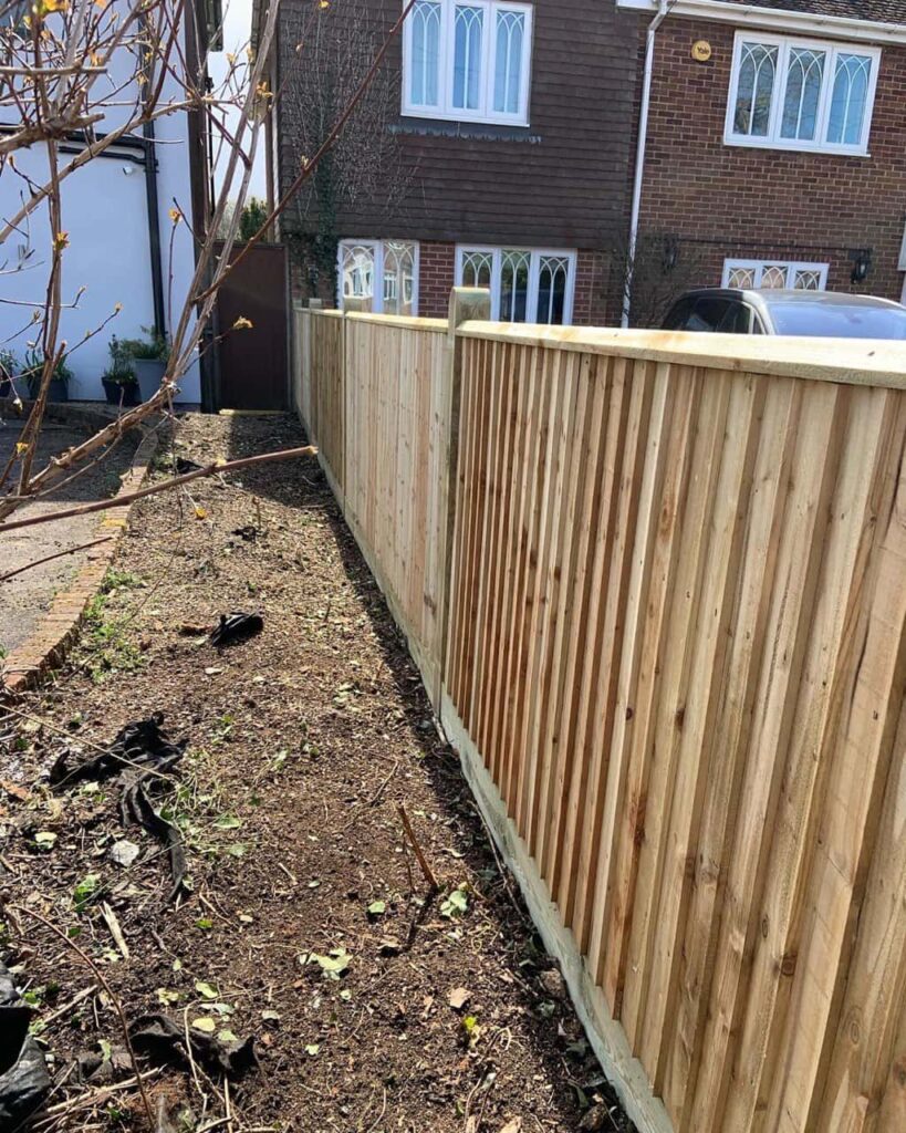 This is a photo of feather edge fencing installed in a residential property by Fast Fix Fencing